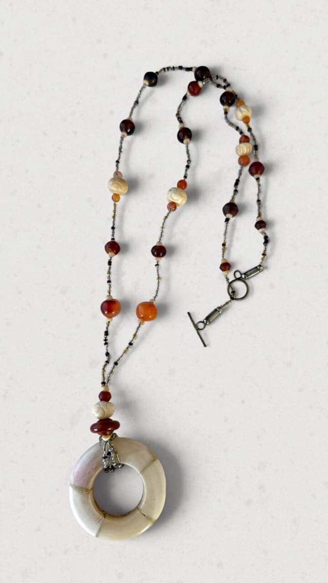 Neutral Tone Beaded Necklace with Shell Donut Pendant