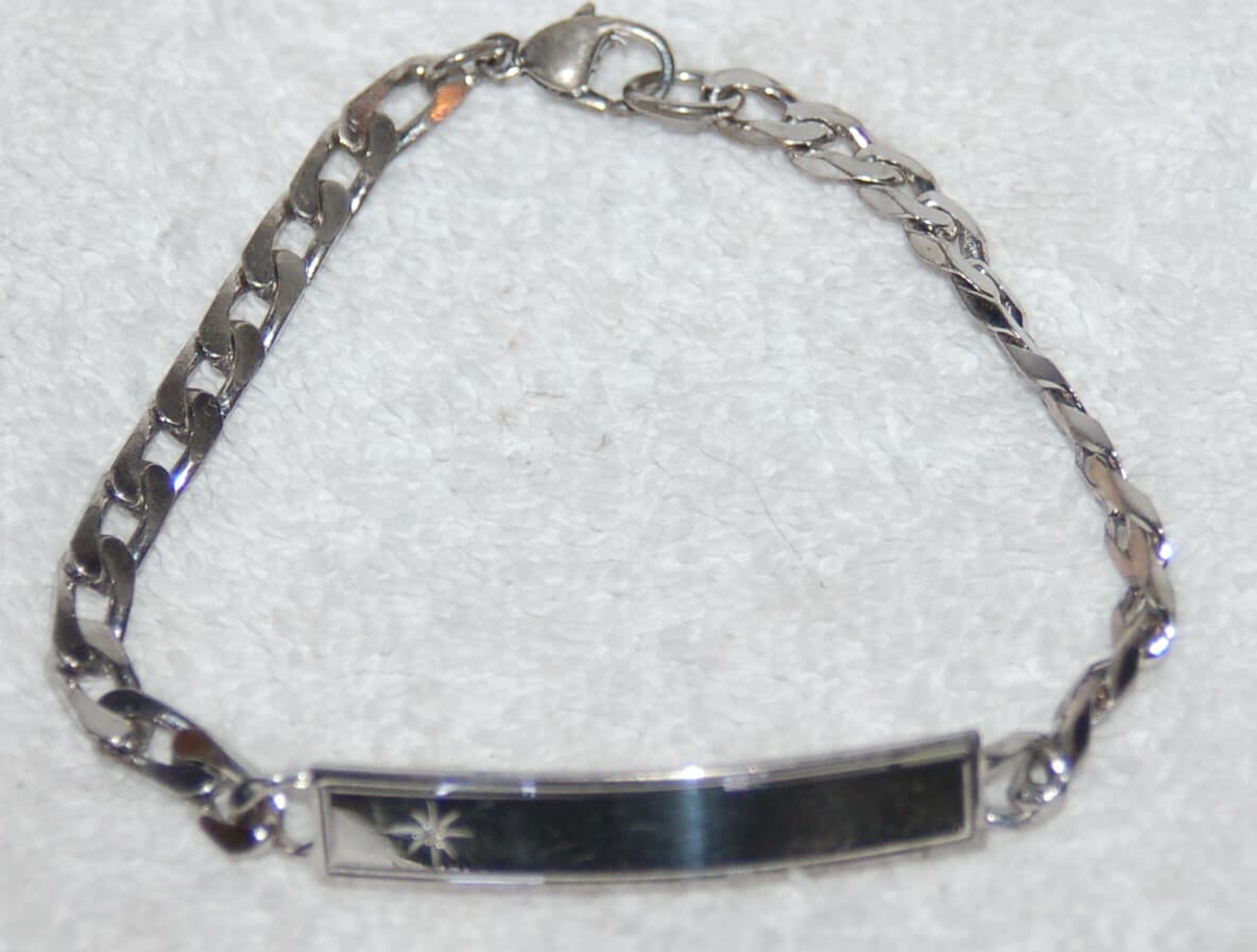 VINTAGE STERLING SILVER ID BRACELET MARKED SIMMONS 7 grams