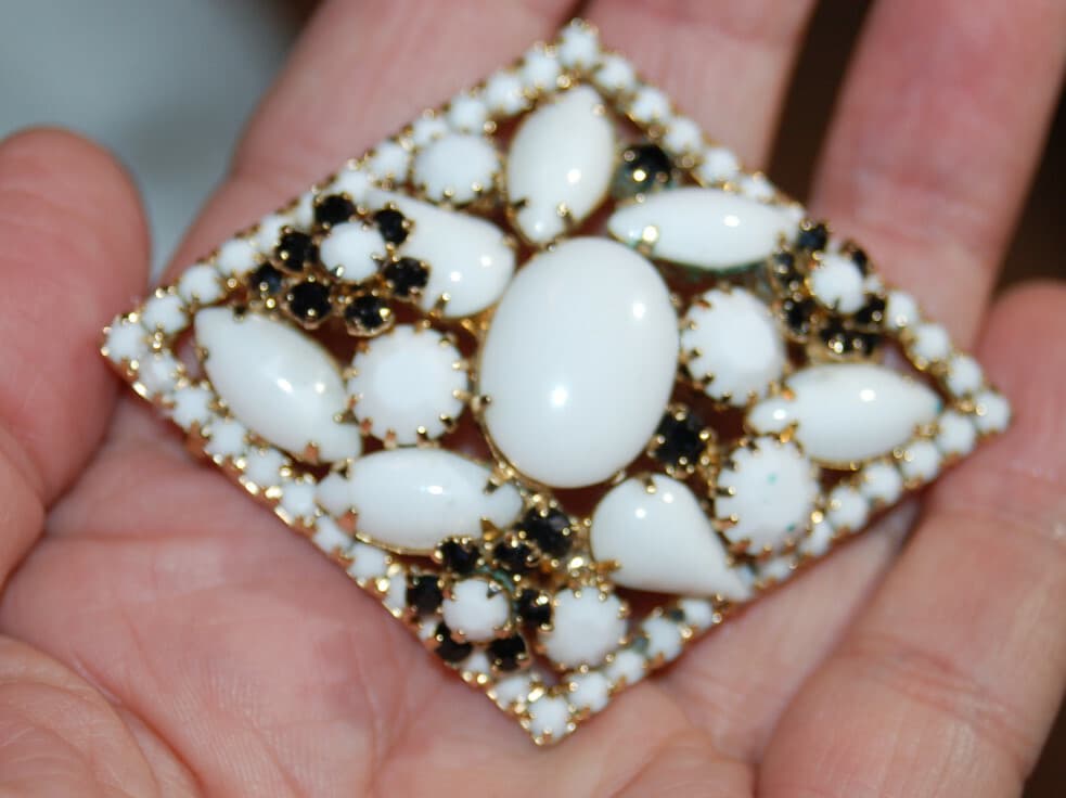 Vintage white Milk Glass Prong Set Brooch Pin with small black jet flowers