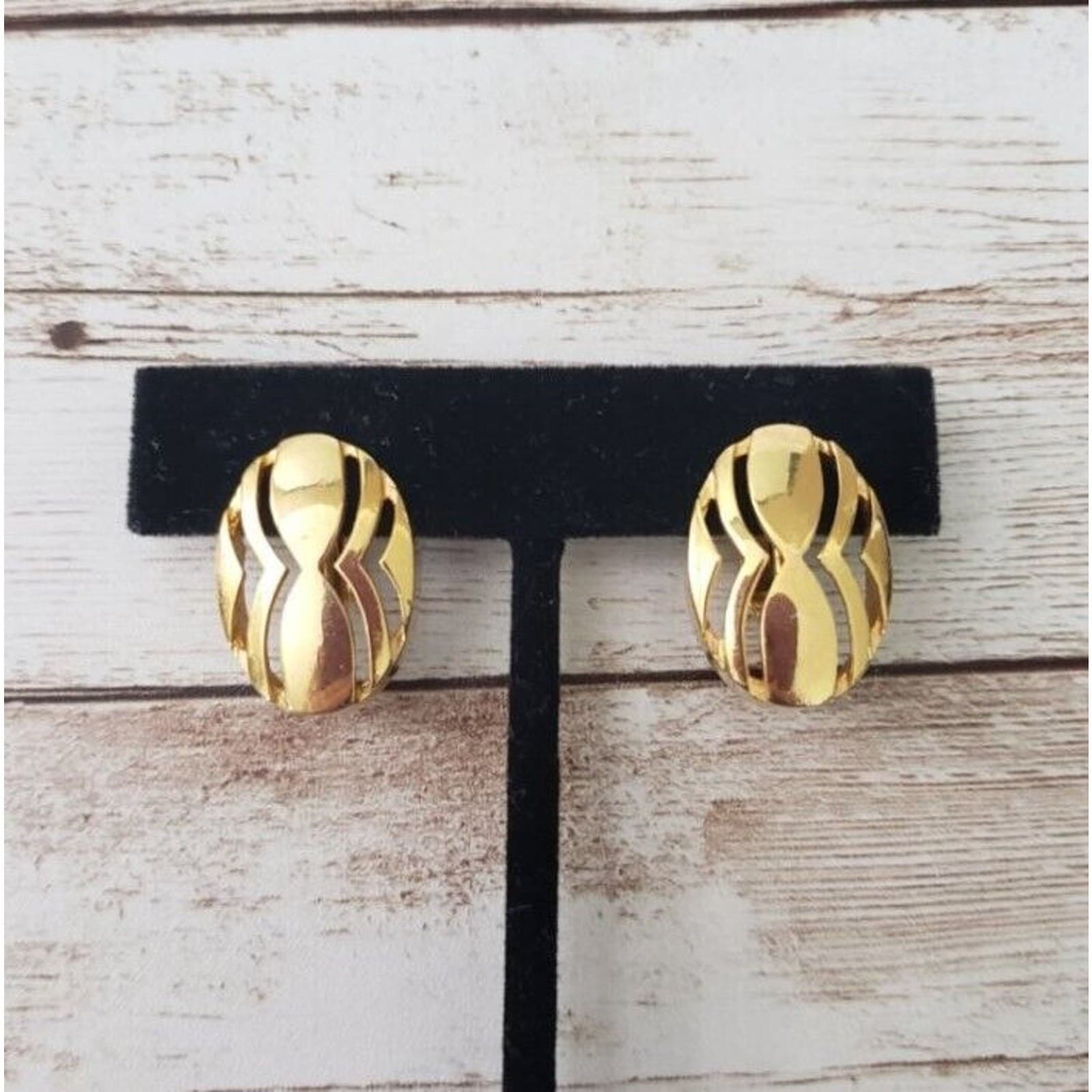 Vintage Clip On Earrings - Unusual Cut Out Gold Tone Oval