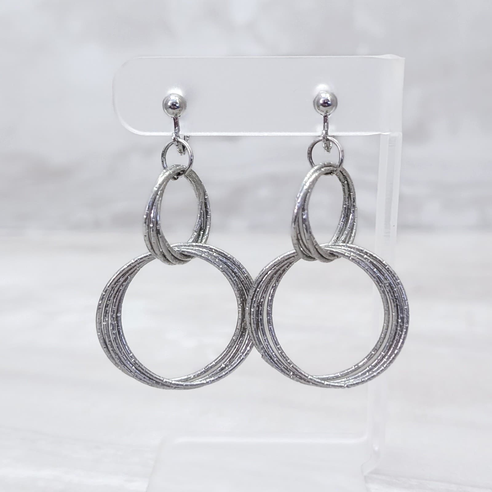 Vintage Clip On Earrings Long Dangle Textured Silver Tone Interlocking Circles