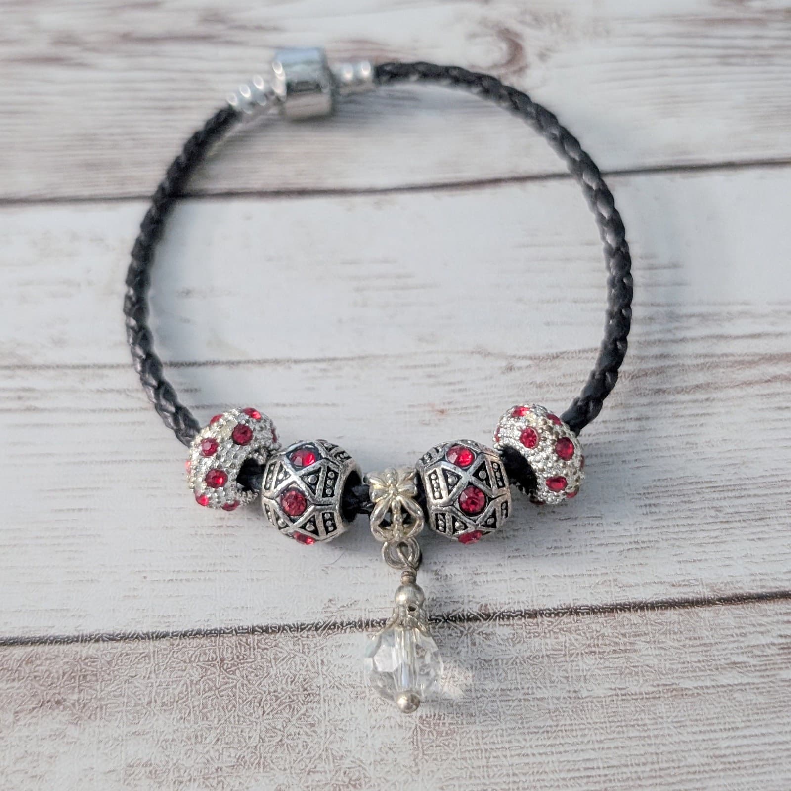 Red & Silver Tone Charm Bracelet with Black Cord