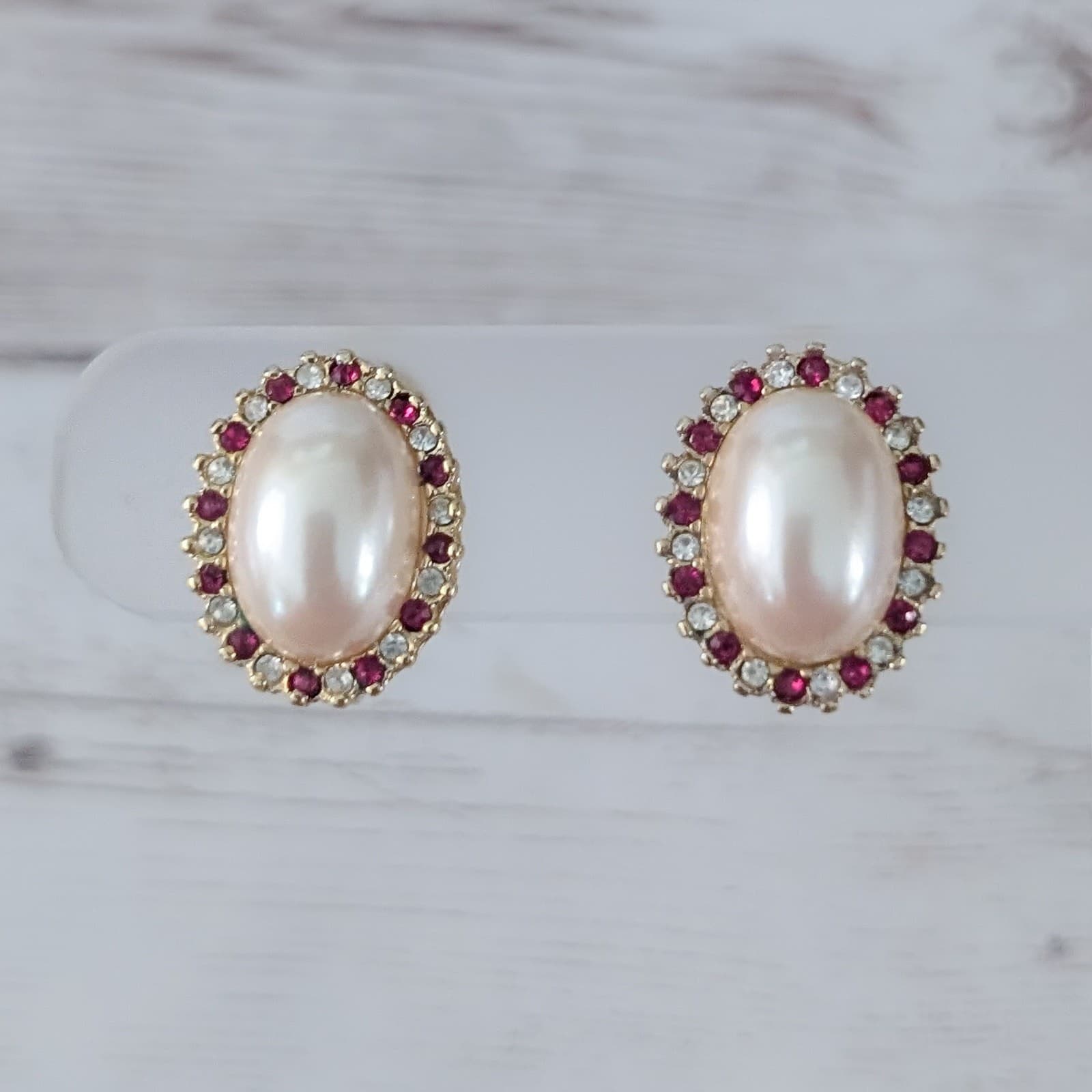 Vintage Monet Clip On Earrings Large Oval Faux Pearl with Red & Clear Gems Halo