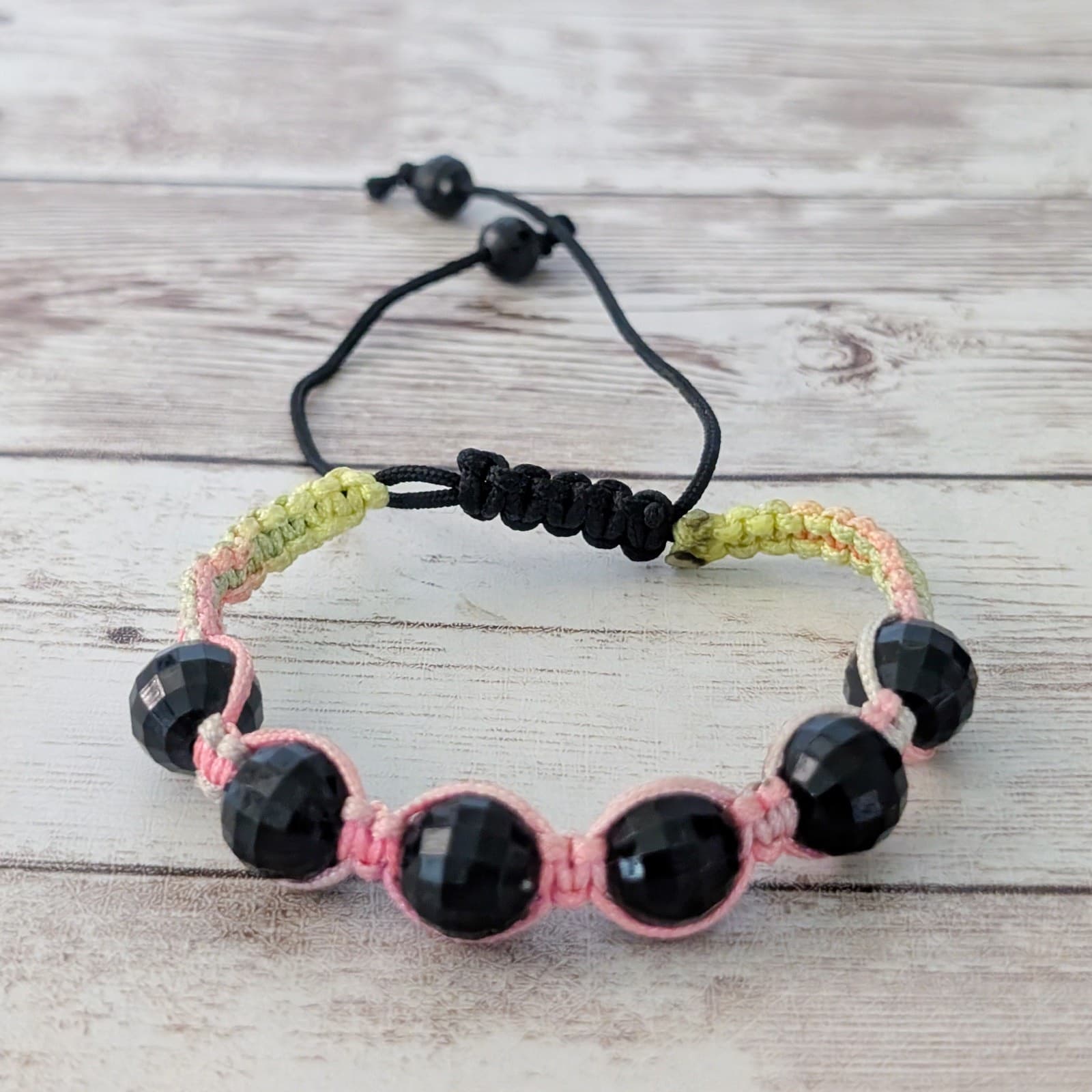 Black Wrapped Beads with Multi Colored Cord Bracelet