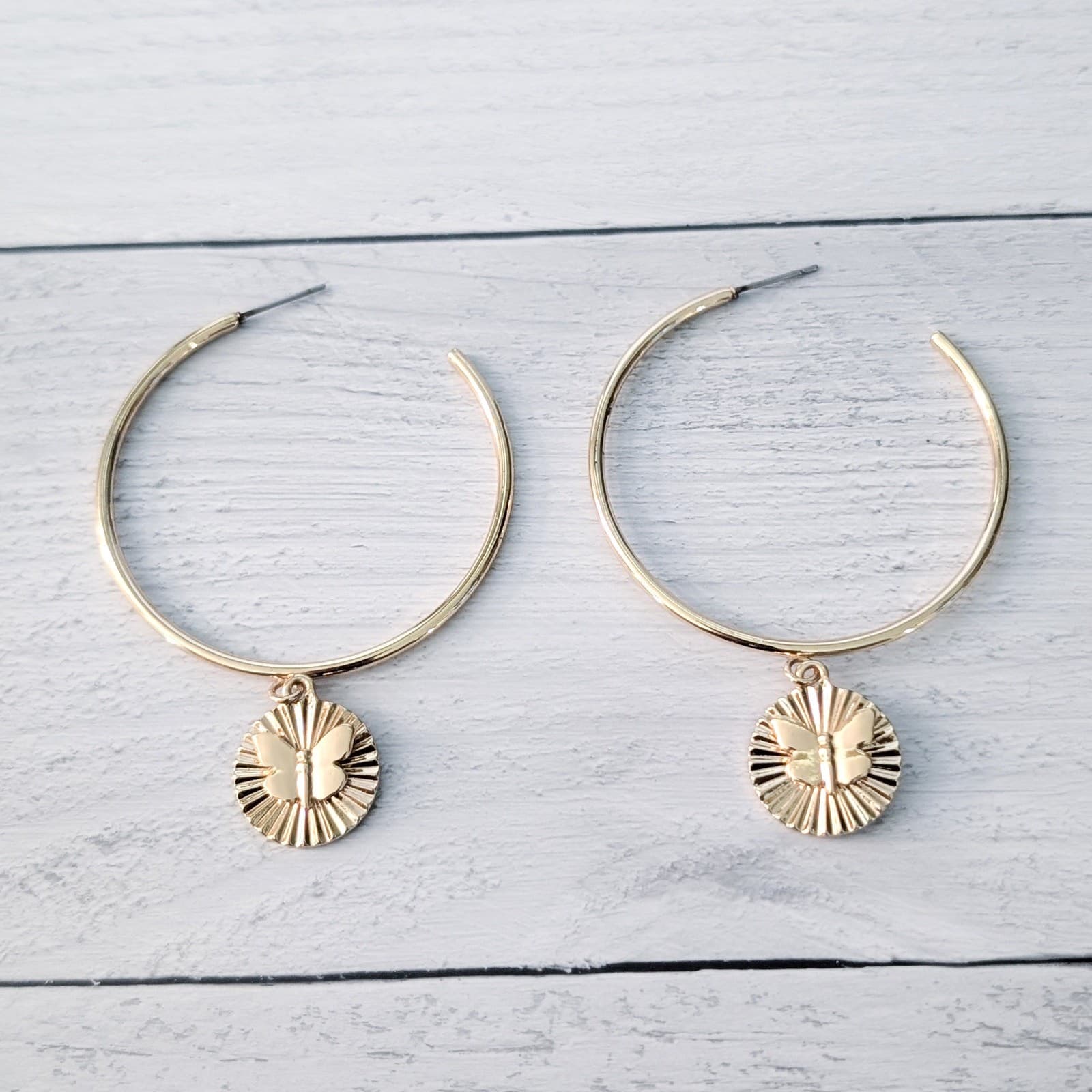 Extra Large Gold Tone Hoop Like Stud Earrings with Butterfly Charm