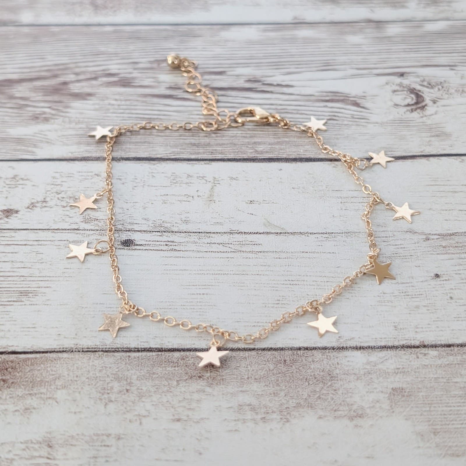 Gold Tone Anklet with Star Charms
